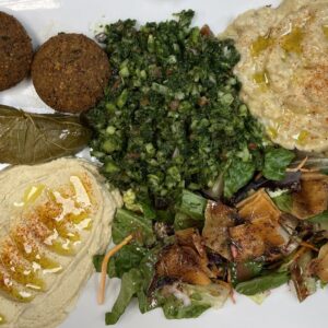 Mezze and Chana – Vegan Restaurant in Louisville. Chana masala with side pita or rice arranged with vegan Mezze